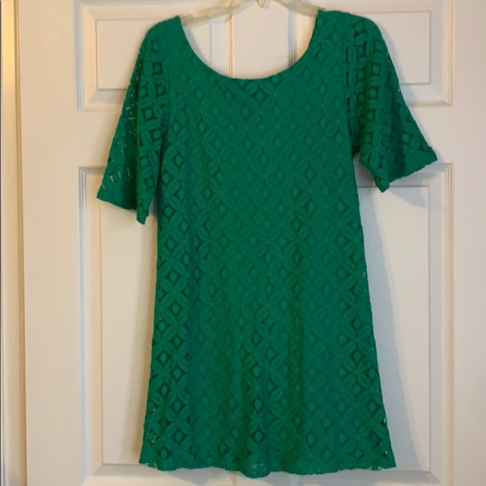 Short sleeve, mini dress. Lace overlay.